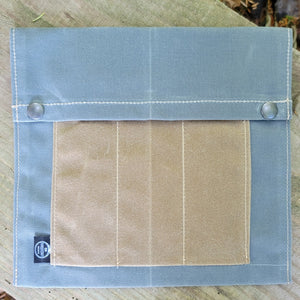 waxed canvas bag to hold plates and forks