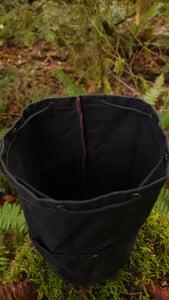 Black Waxed Canvas Cedar Bucket Bag with Outside Pockets.