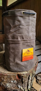 Waxed canvas bucket bag with ombre leather patch