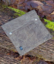 Waxed Canvas bag designed to hold outdoor gear