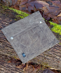 Waxed Canvas bag designed to hold outdoor gear